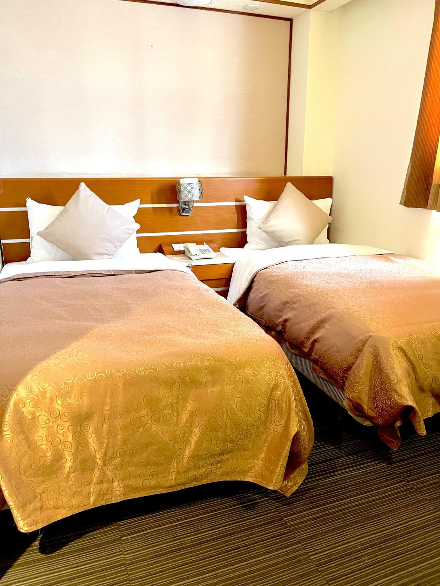 Hua Guo Hotel Цзилун Номер фото