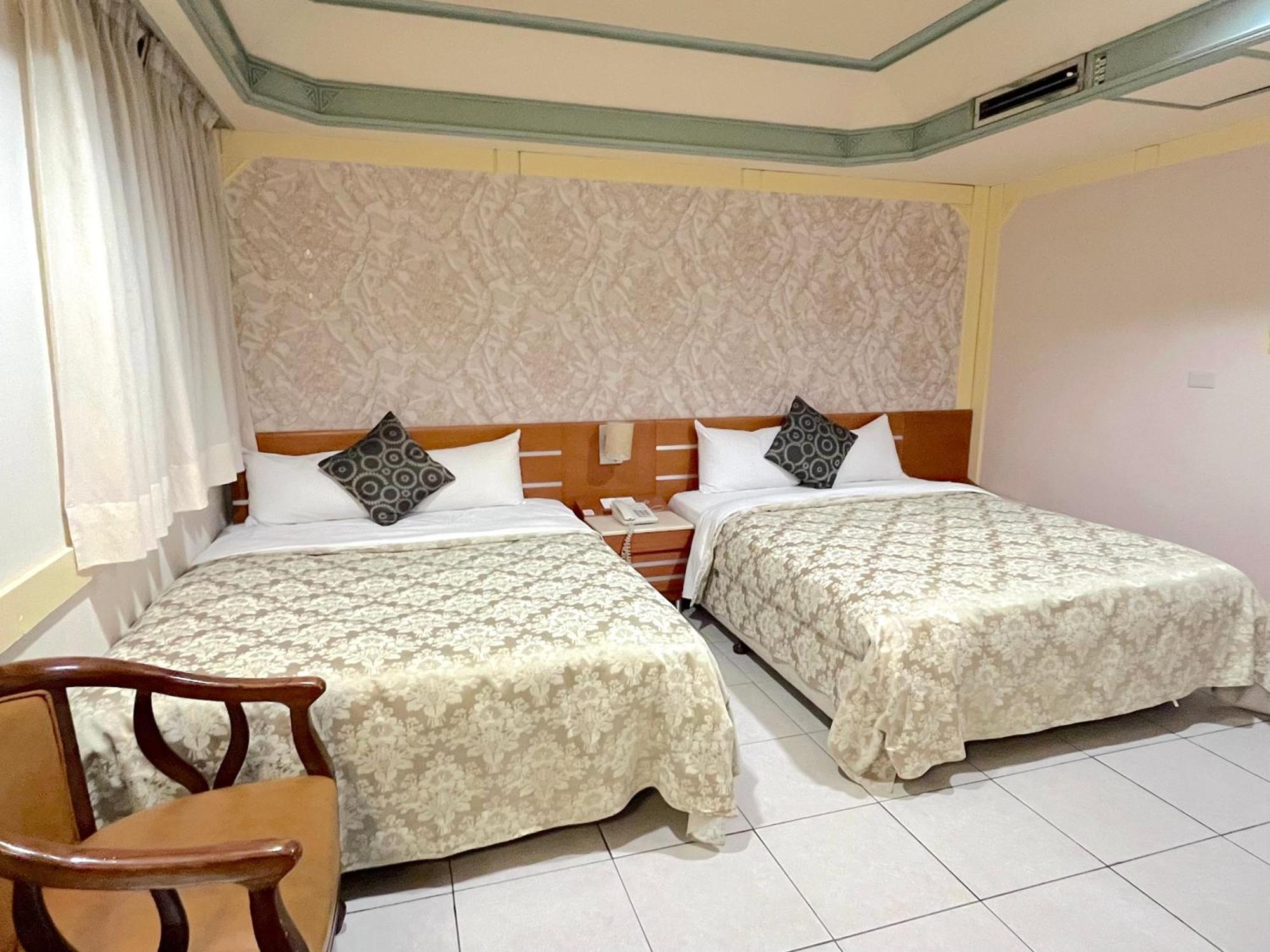 Hua Guo Hotel Цзилун Номер фото