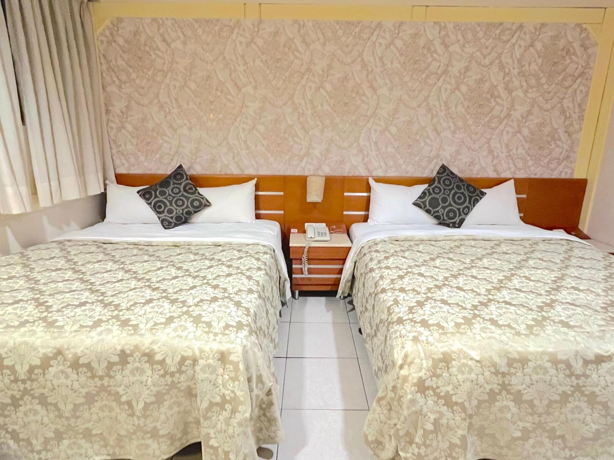 Hua Guo Hotel Цзилун Номер фото
