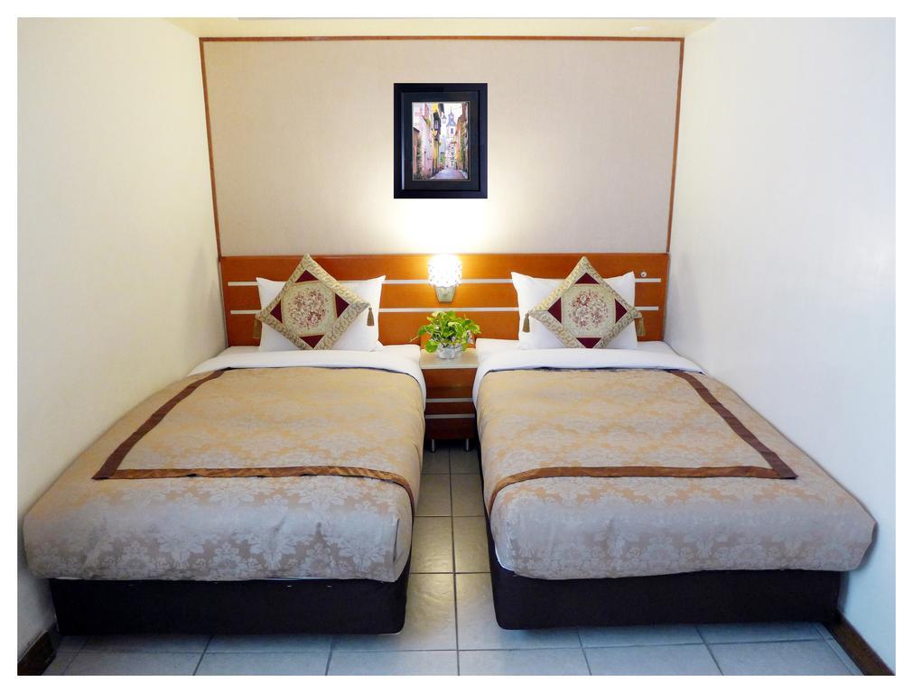 Hua Guo Hotel Цзилун Номер фото